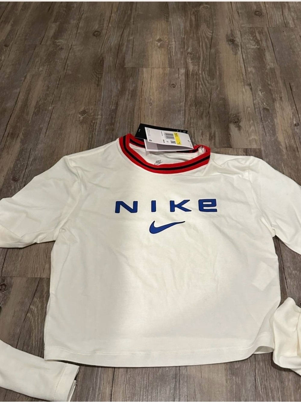 Nike White Long-Sleeve Tee with Blue Logo and Red-Trim Collar